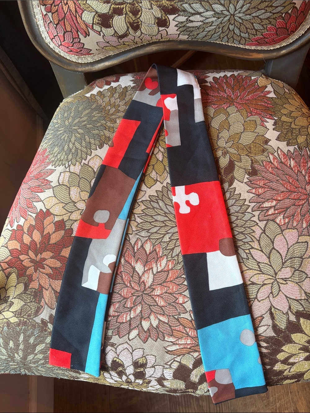 Source Unknown Colorblock Puzzle-Print Skinny Scarf in Red, Black, Blue, Brown